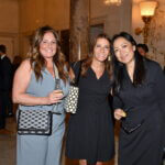 Women in cocktail dresses at the June 2025 dinner
