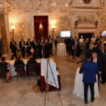 Crowd gathered in the grand hall at the June 2025 dinner